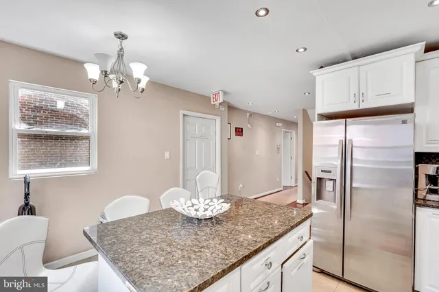 a bed room with a bed and a television