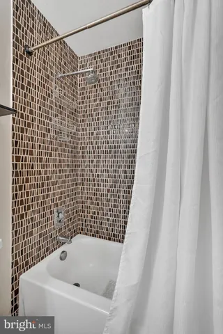 a bathroom with a bathtub