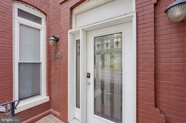 a kitchen with a sink cabinets and stainless steel appliances