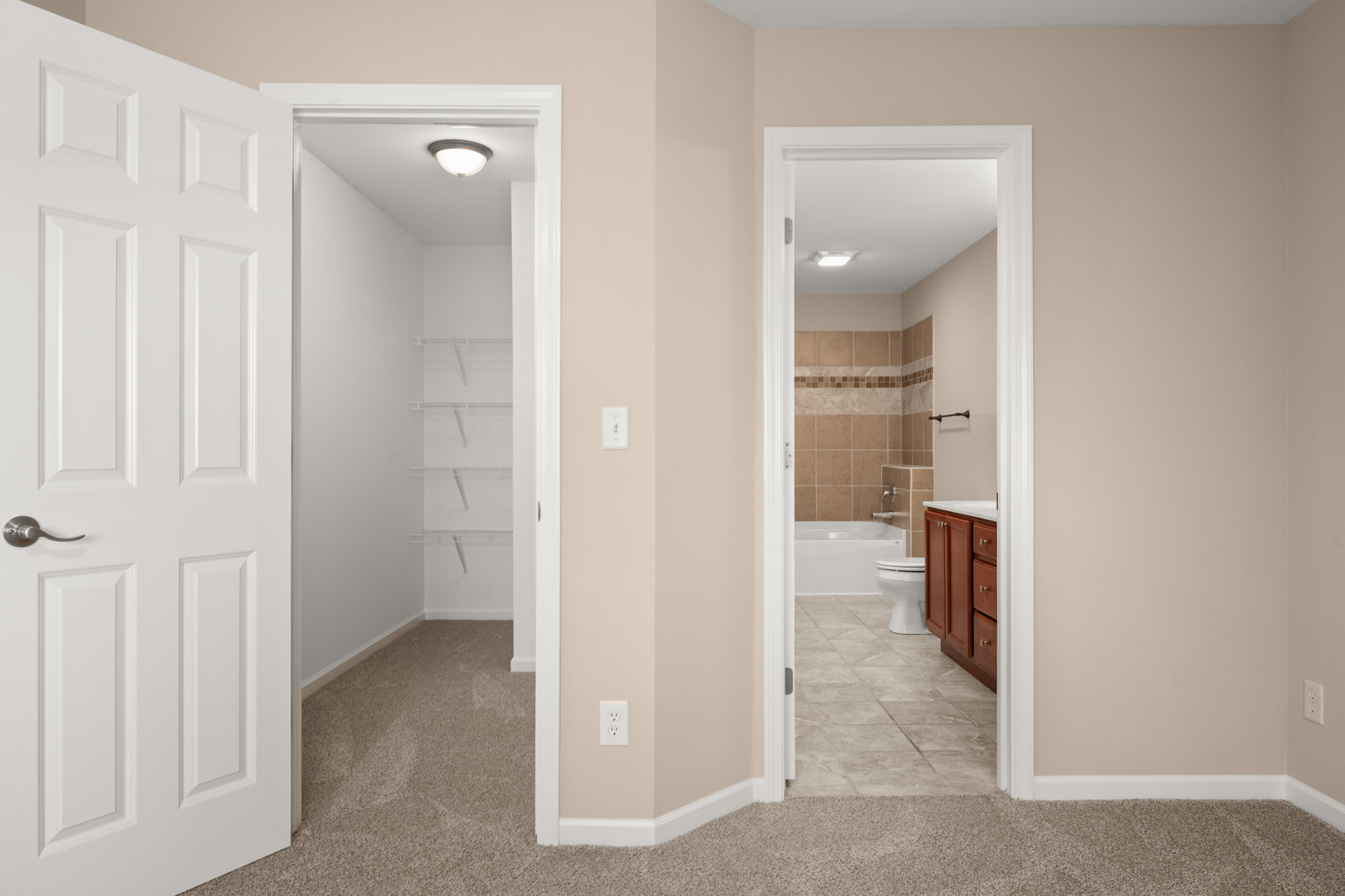 3705 Green Tree Lane DeKalb, IL 60115 - Photo 18 of 31 a view of a bathroom with a glass shower door
