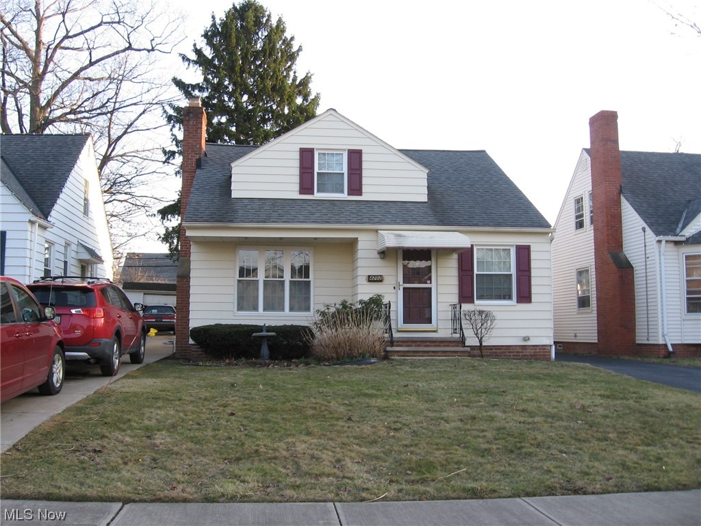 4202 Stilmore Road Cleveland, OH 44121 - Photo 1 of 21 View of front of property featuring a front yard
