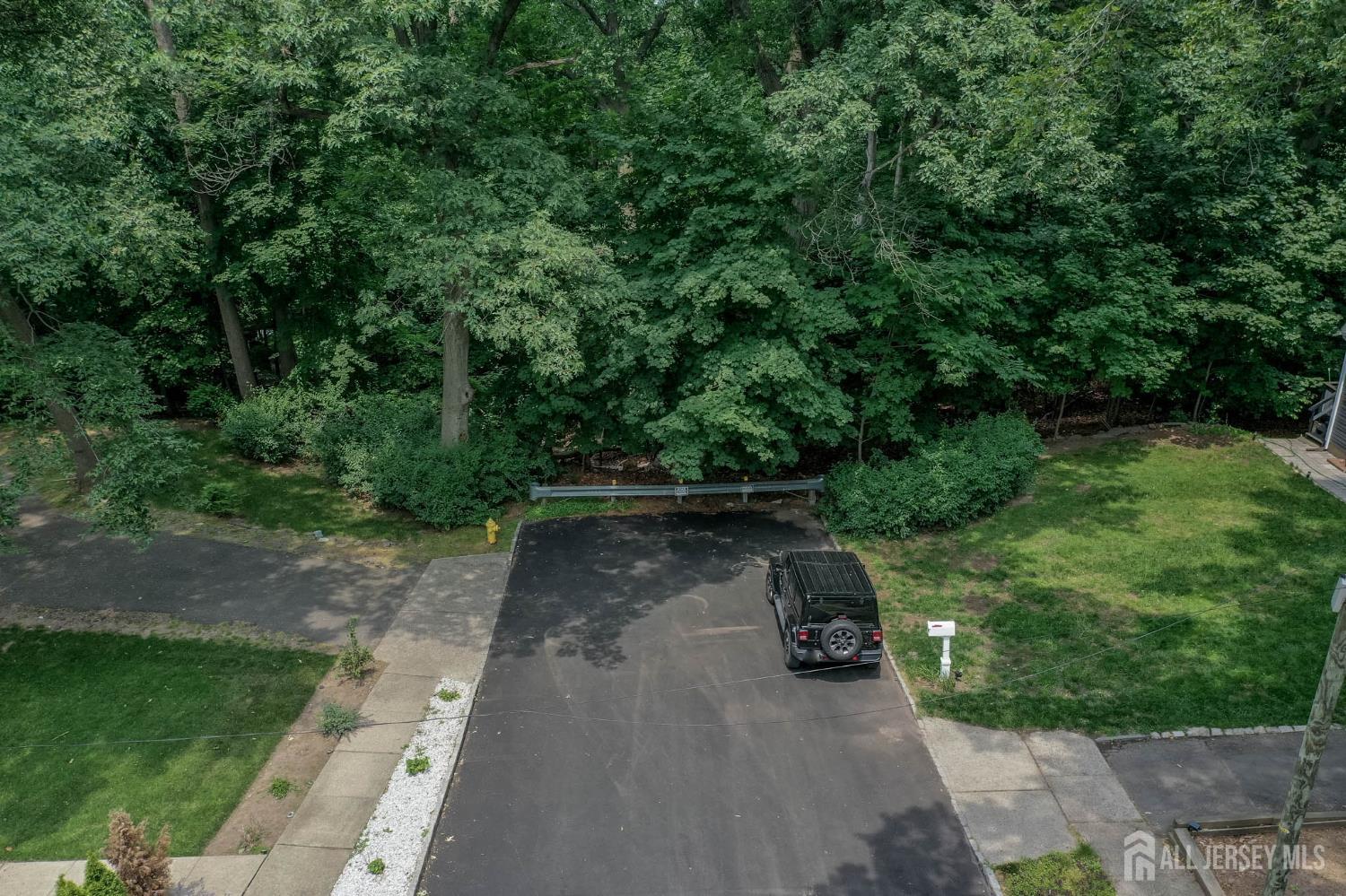 39 Forest Drive Bloomfield, NJ 07003 - Photo 15 of 15 a view of a street with a yard