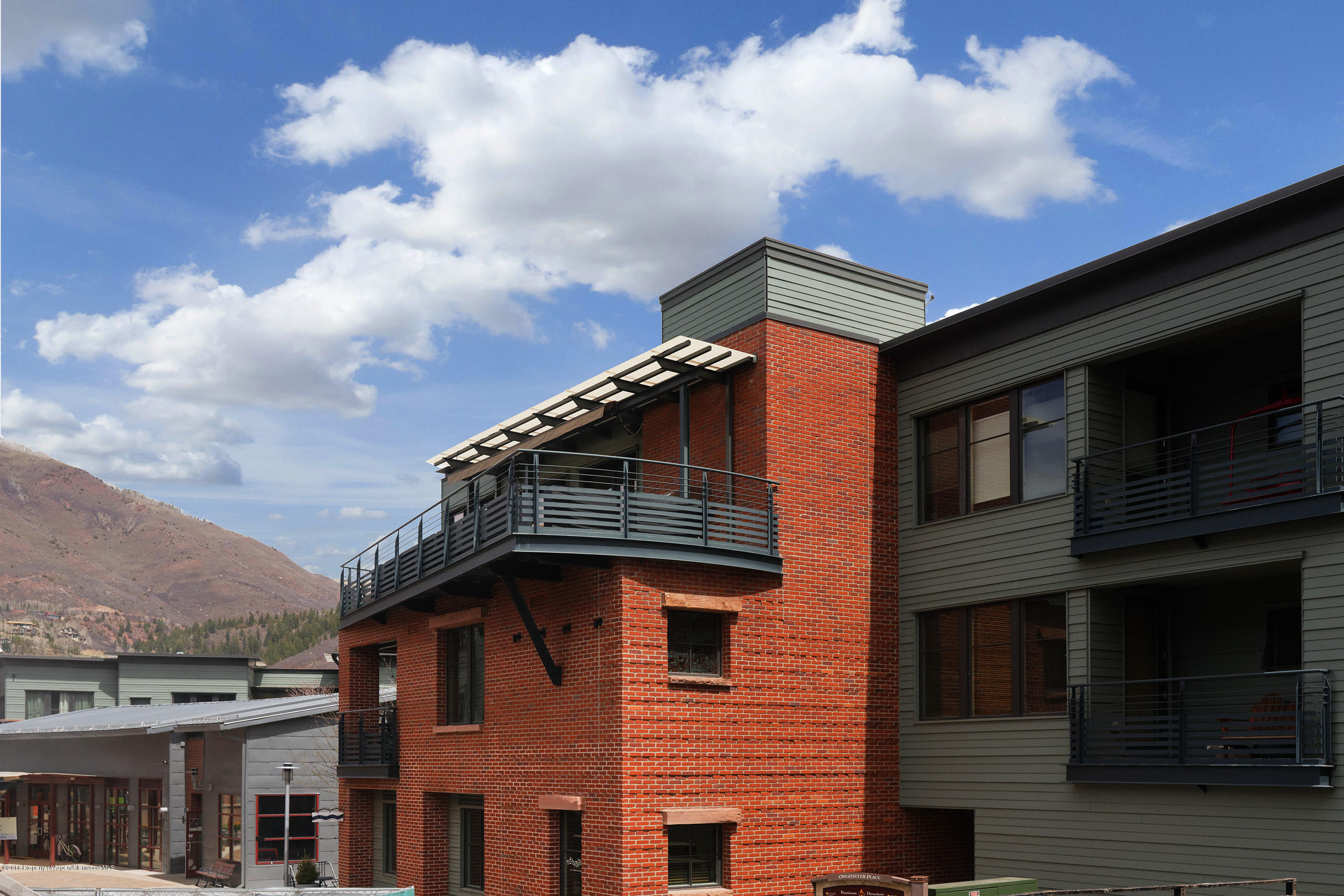 102 Founders Place, Unit 301 Aspen, CO 81611 - Photo 24 of 28 a front view of a house