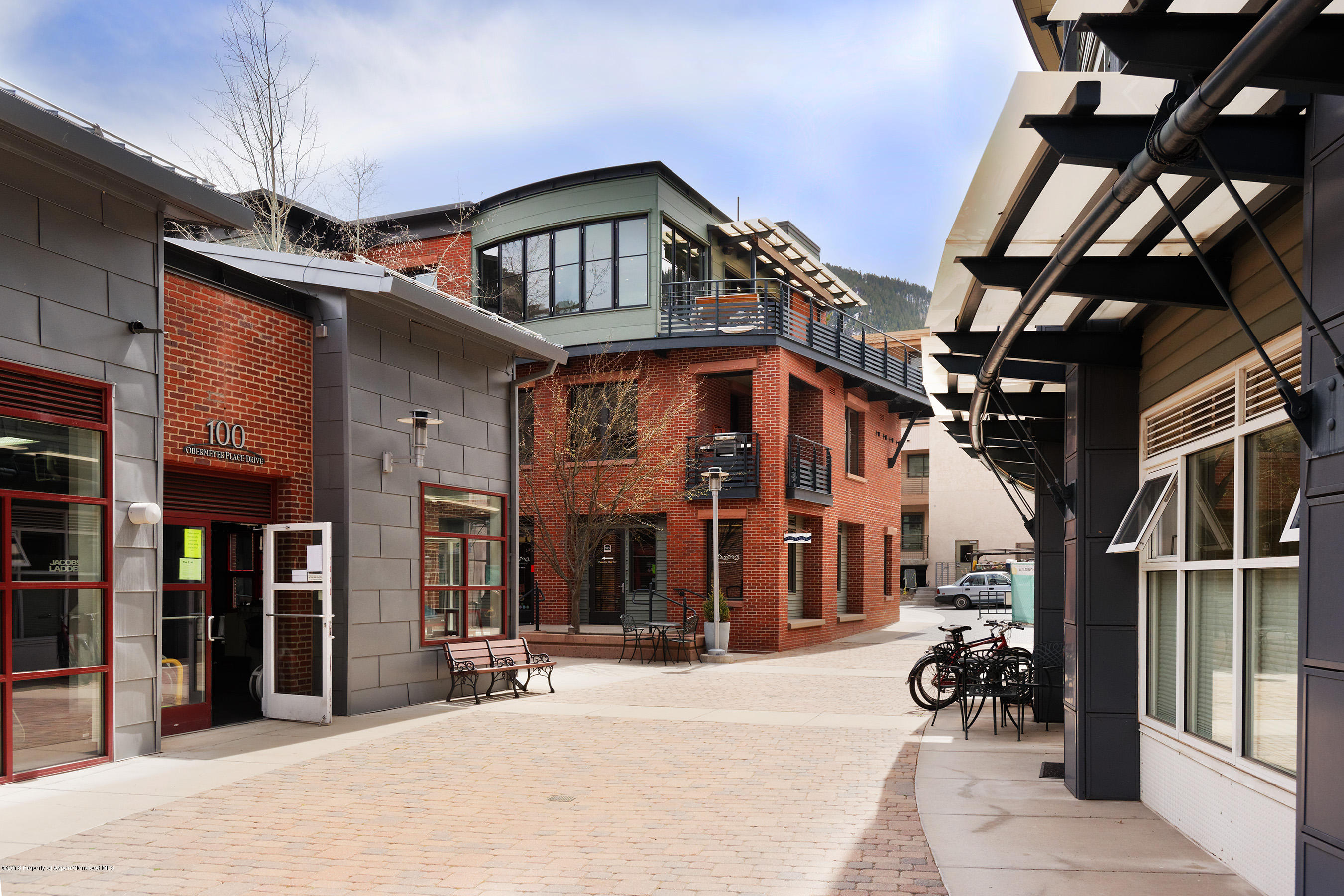 102 Founders Place, Unit 301 Aspen, CO 81611 - Photo 25 of 28 a view of a building with a street