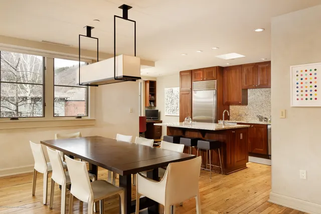 a view of a dining room with furniture