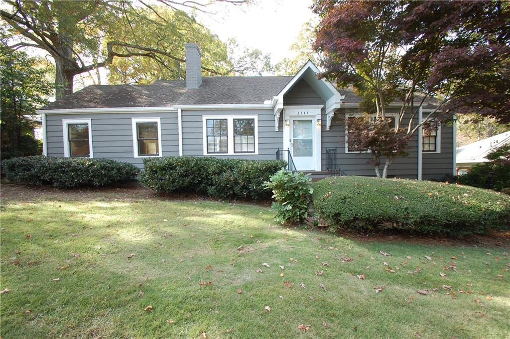 3347 College Street Atlanta, GA 30337 - Photo 1 of 39 a front view of a house with garden