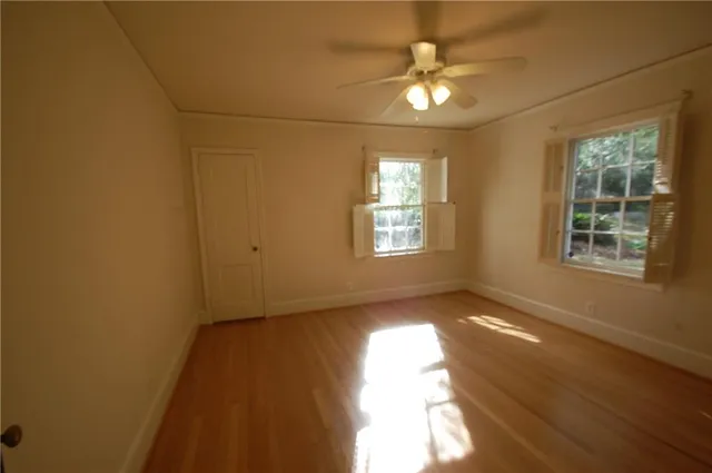 a view of an empty room and window