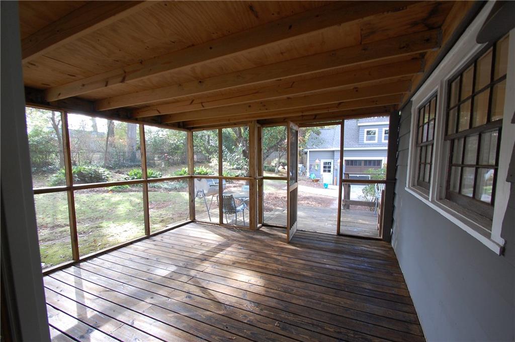 3347 College Street Atlanta, GA 30337 - Photo 30 of 39 a view of empty room with wooden floor and fan