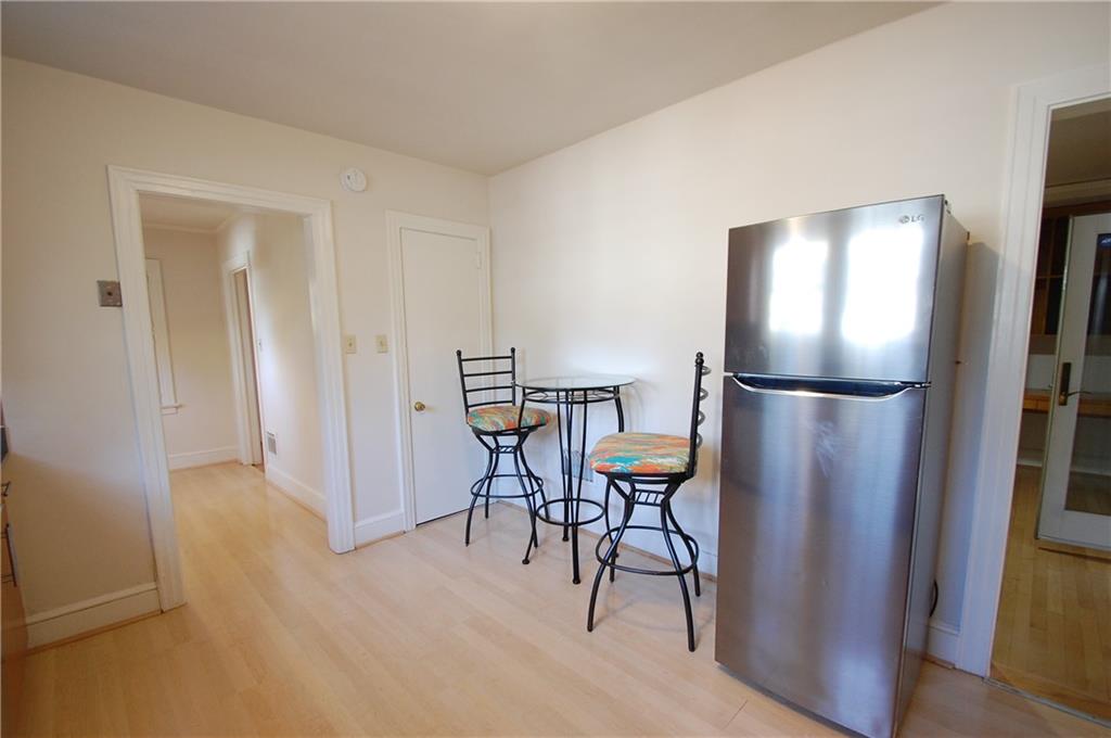 3347 College Street Atlanta, GA 30337 - Photo 8 of 39 a view of a refrigerator in kitchen and an empty room