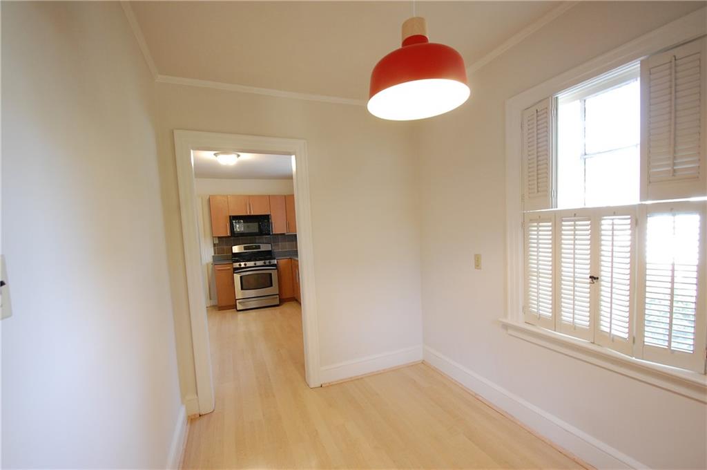 3347 College Street Atlanta, GA 30337 - Photo 10 of 39 wooden floor in an empty room with a window