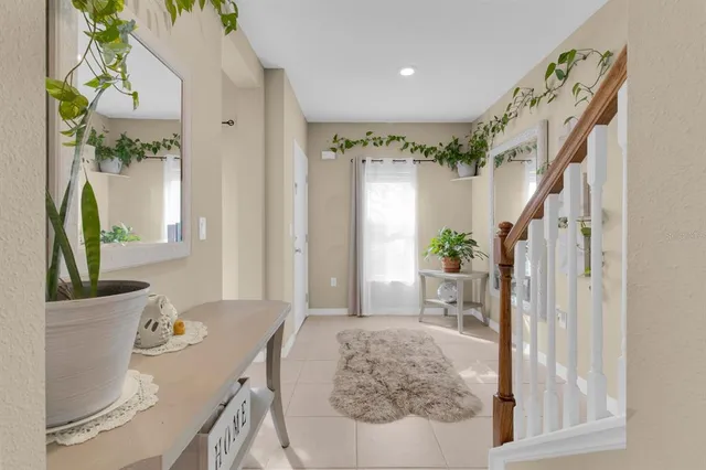 a kitchen with a sink counter top space appliances and cabinets