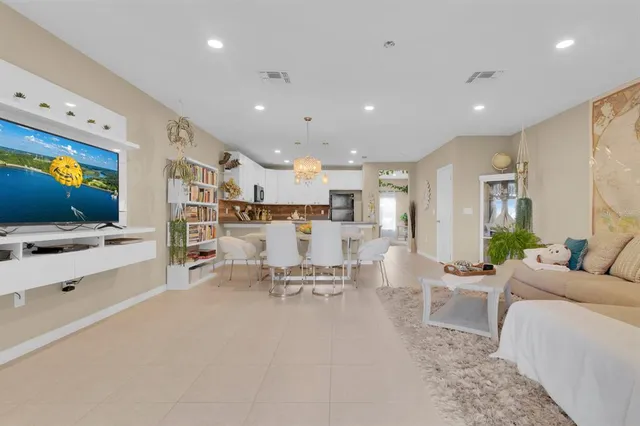 a view of a balcony with lake view and a potted plant