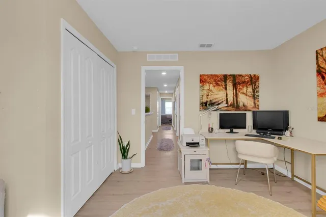 a view of hallway with furniture and garden