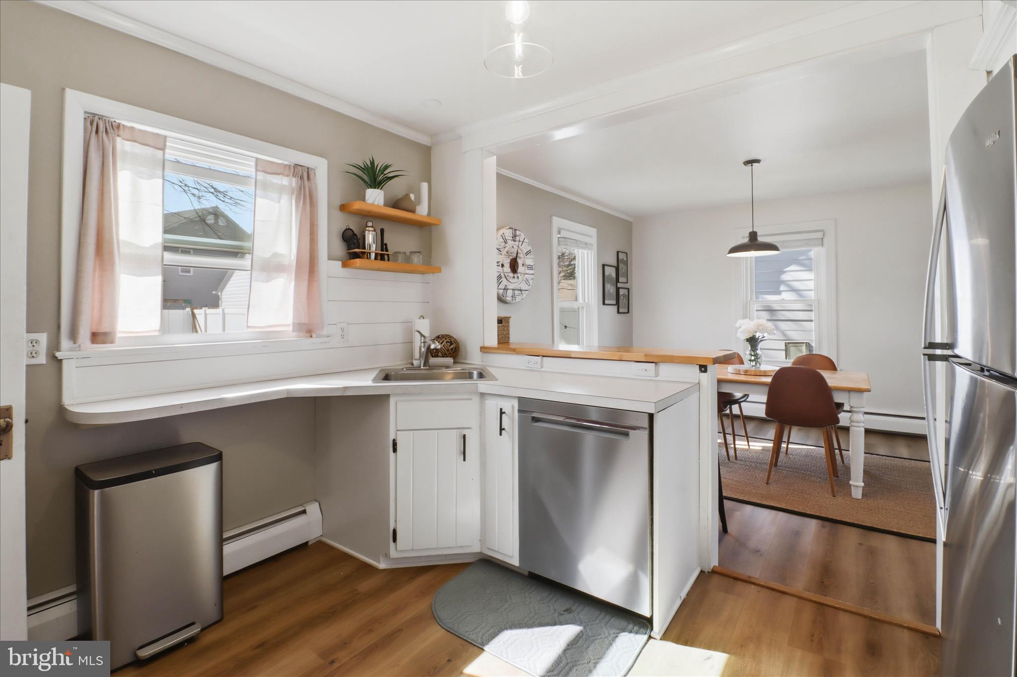 327 Dover Street Manheim, PA 17545 - Photo 13 of 43 a kitchen with a stove a sink and a refrigerator