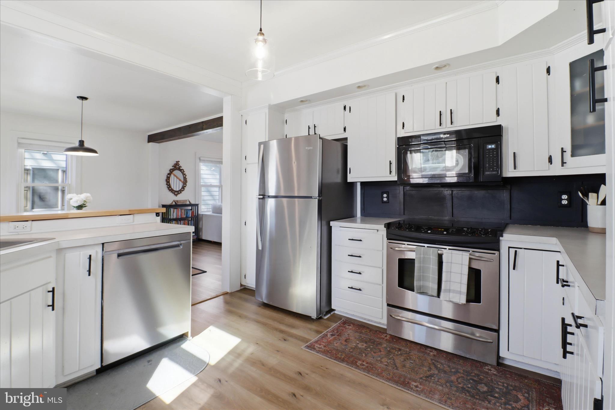 327 Dover Street Manheim, PA 17545 - Photo 15 of 43 a kitchen with stainless steel appliances a refrigerator stove and sink