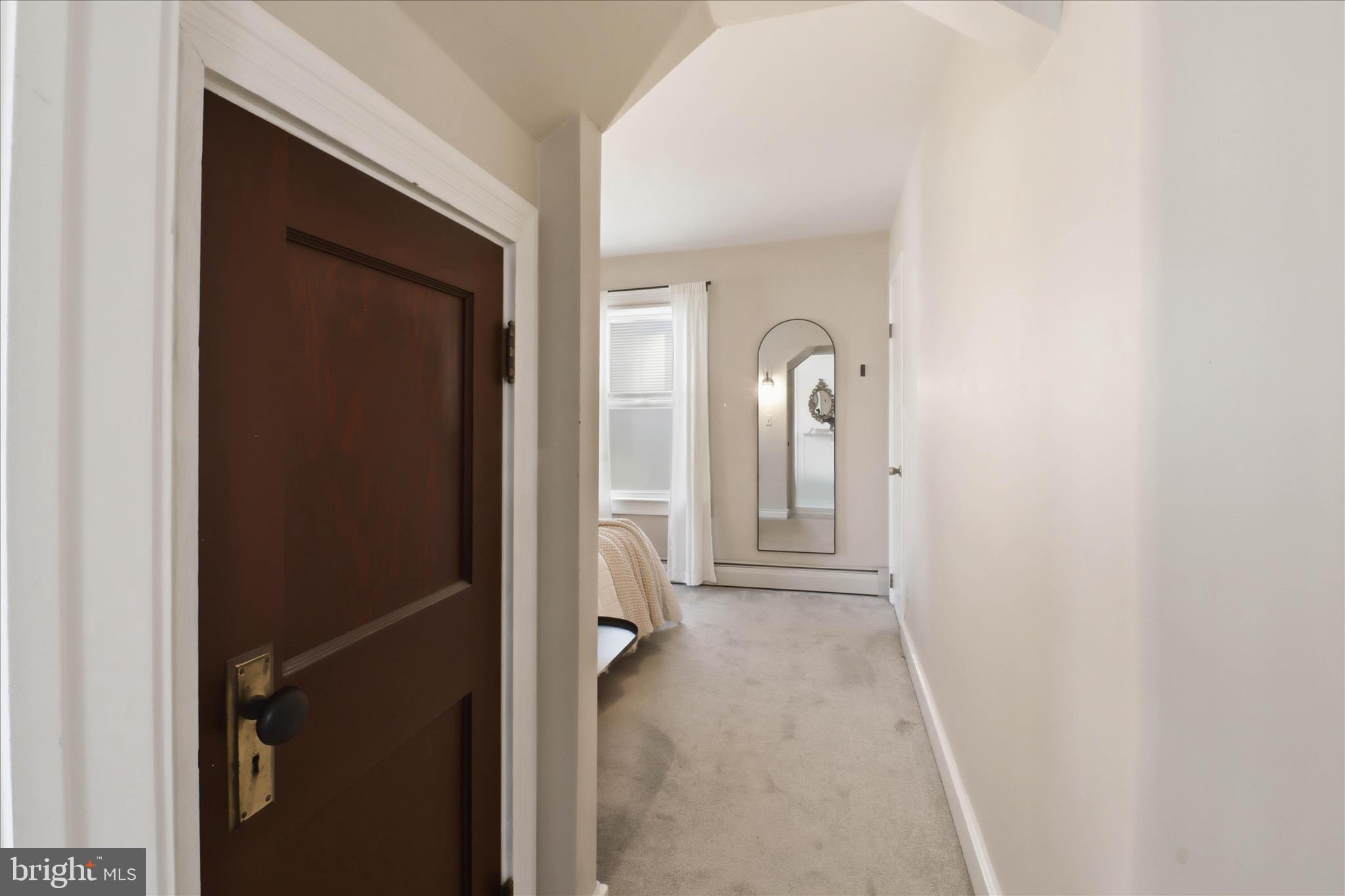 327 Dover Street Manheim, PA 17545 - Photo 18 of 43 a view of a hallway with wooden shelves