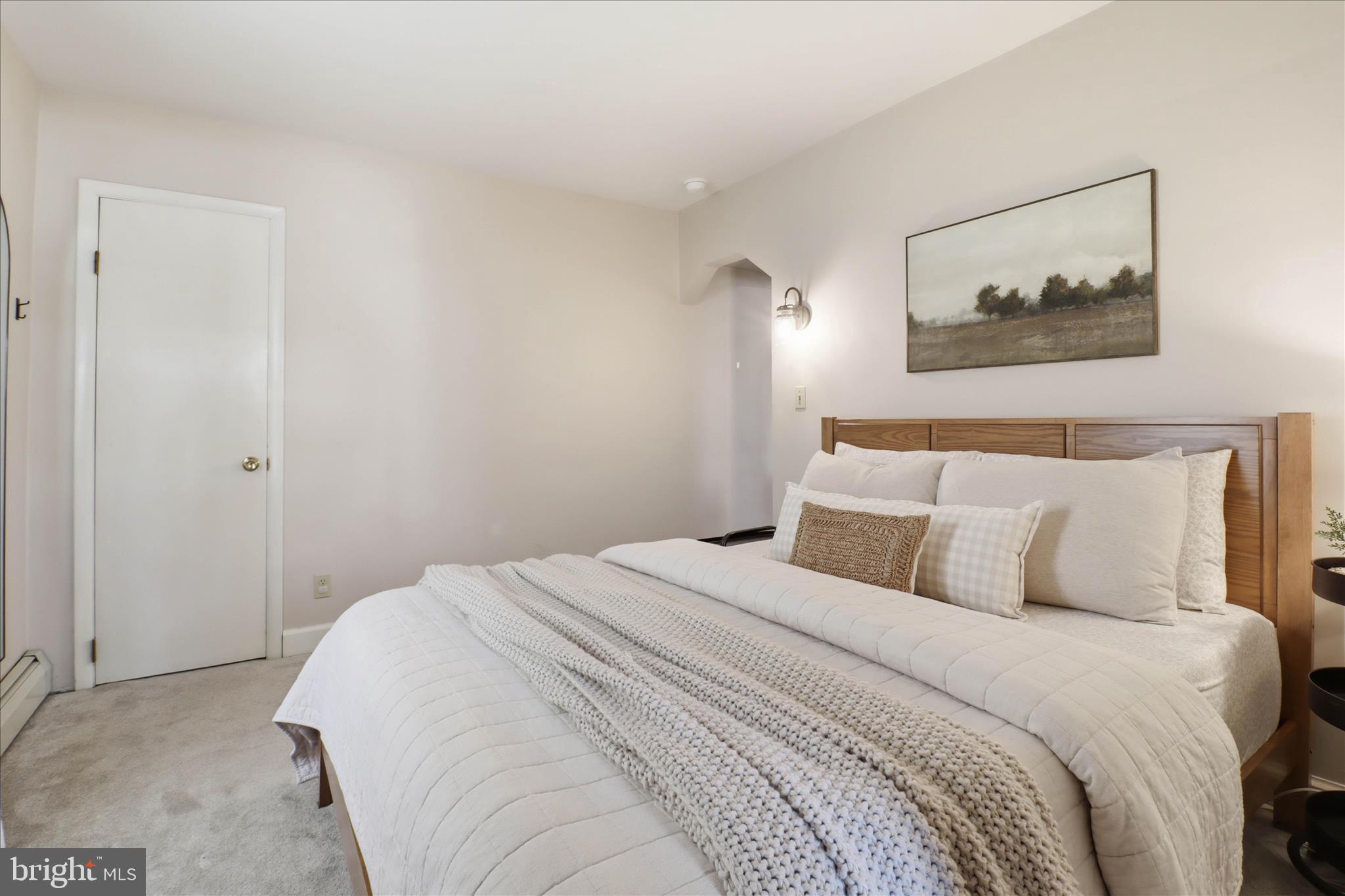 327 Dover Street Manheim, PA 17545 - Photo 21 of 43 a bedroom with a bed and a painting on the wall