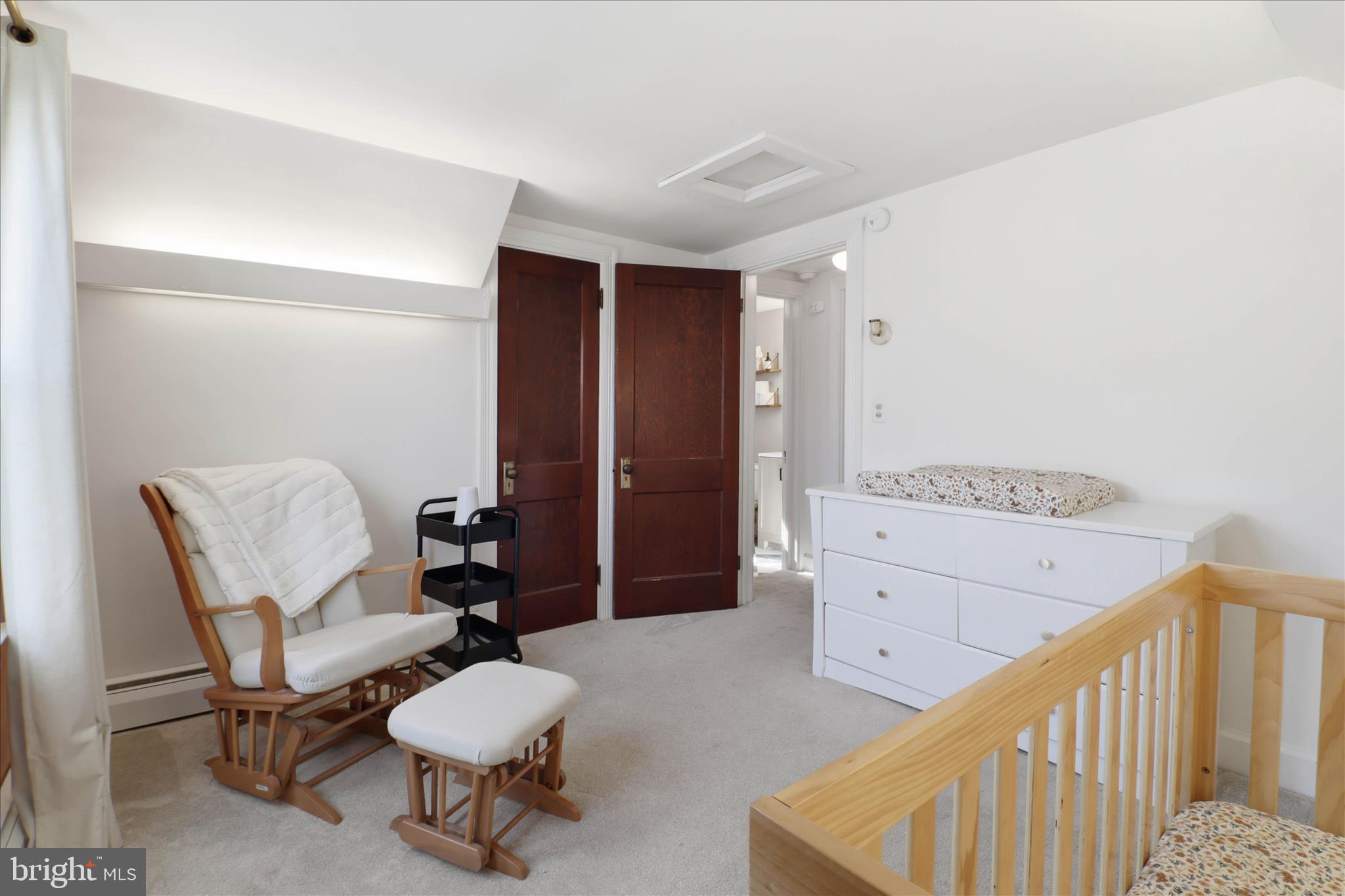 327 Dover Street Manheim, PA 17545 - Photo 29 of 43 a room with a chair and white walls