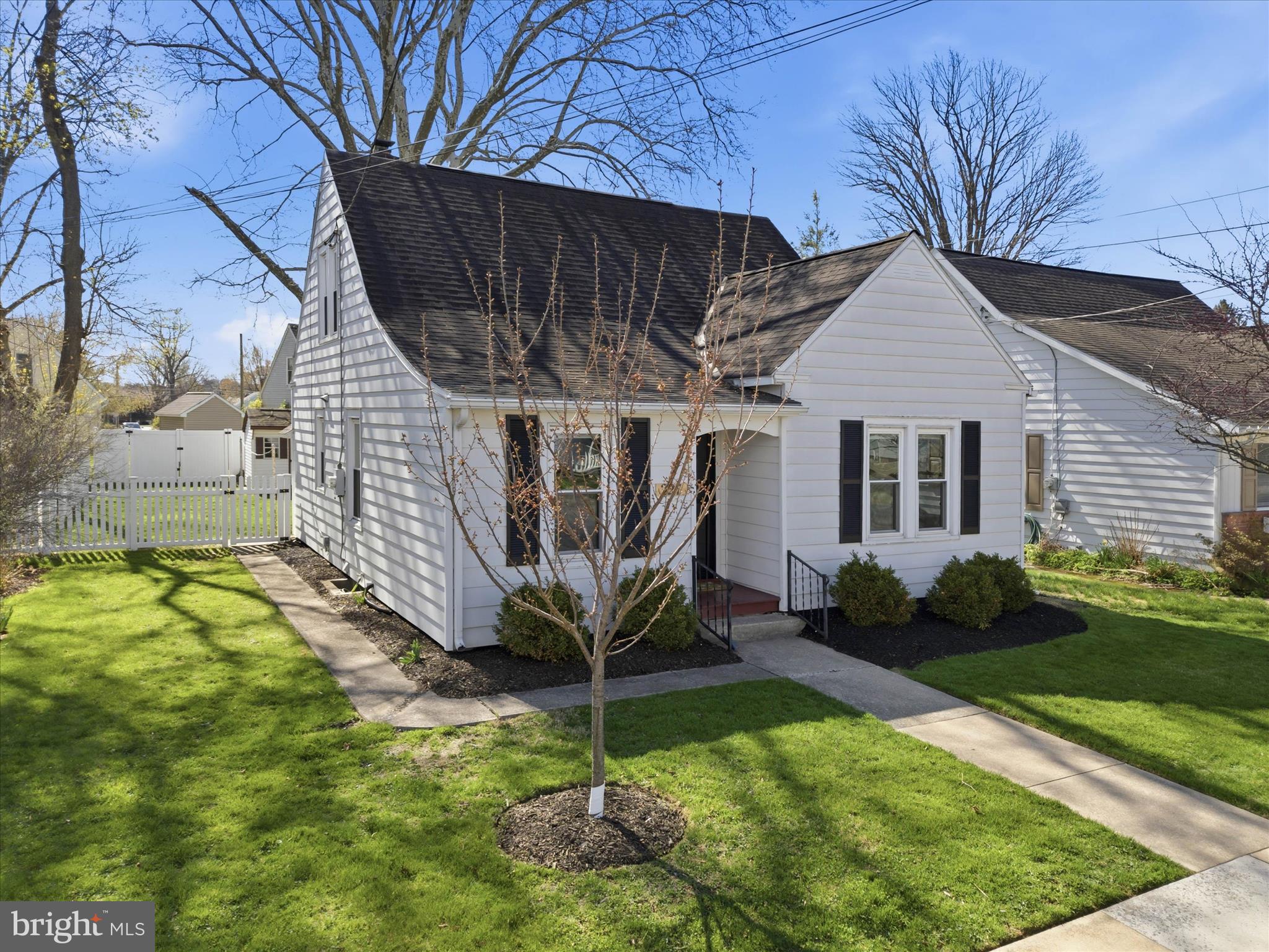 327 Dover Street Manheim, PA 17545 - Photo 3 of 43 a house with garden in front of it
