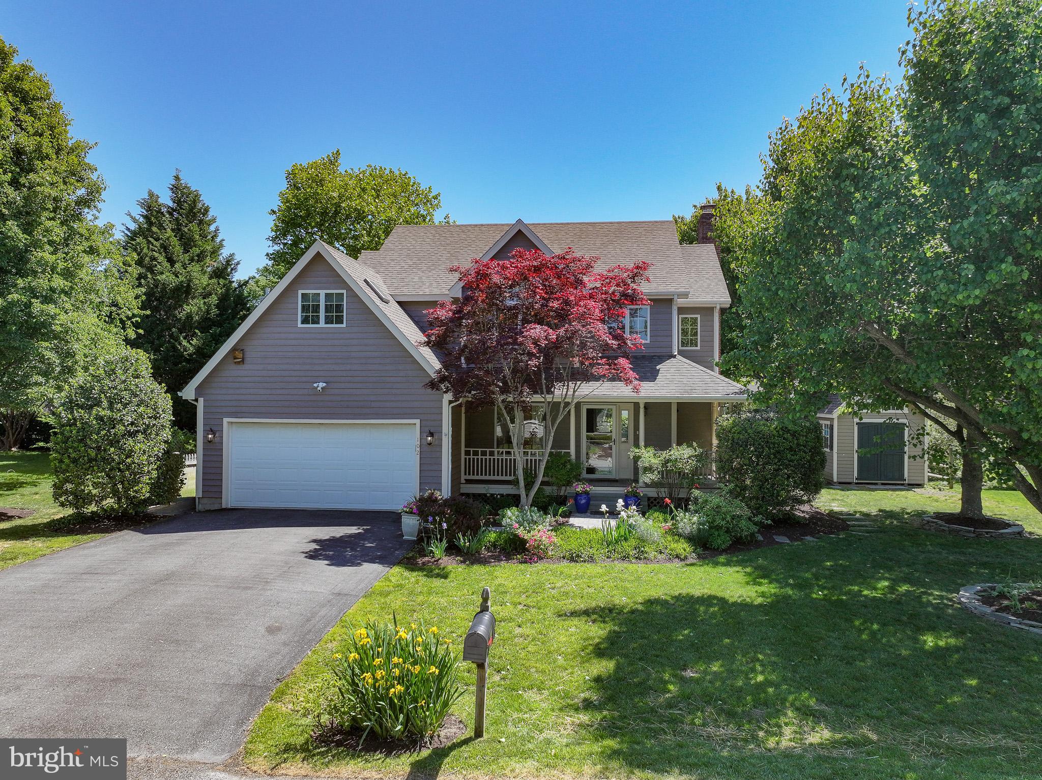 102 Jacks Point Road Oxford, MD 21654 - Photo 1 of 83 a front view of house with yard and green space