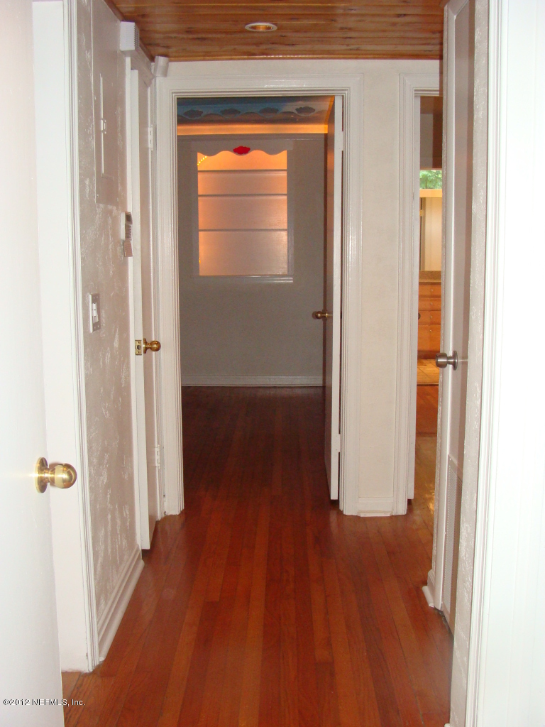 5428 Stetson Road Jacksonville, FL 32207 - Photo 11 of 27 a view of a hallway with wooden floor