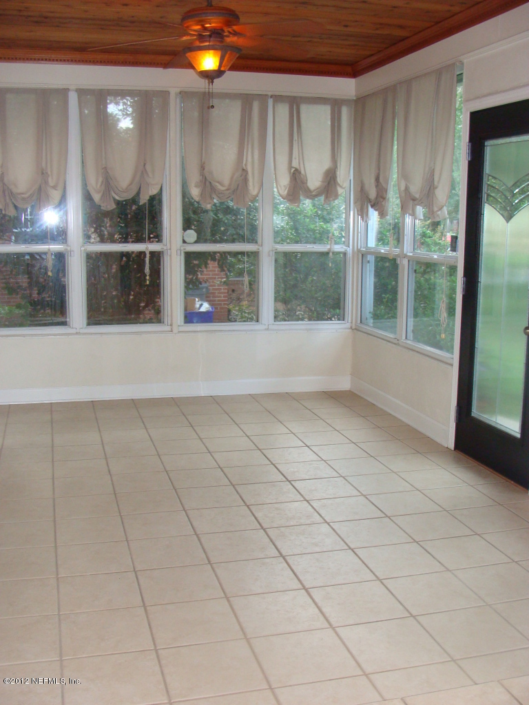 5428 Stetson Road Jacksonville, FL 32207 - Photo 9 of 27 a view of an empty room with a window