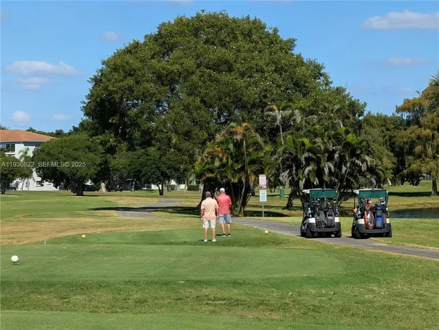 a view of an outdoor space and tennis court