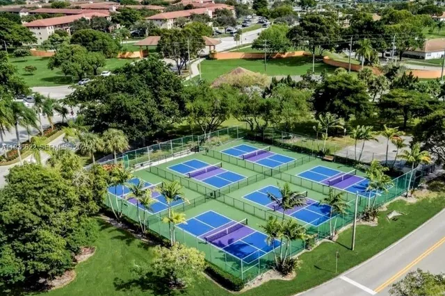 a view of swimming pool with outdoor seating