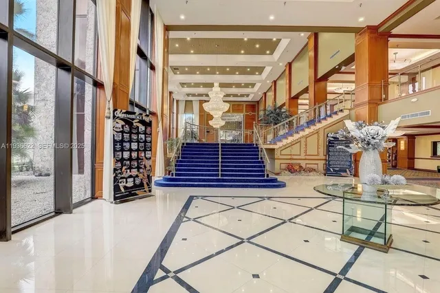 a kitchen with a wooden floor and window