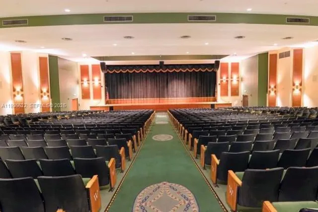 a view of a swimming pool with a backyard