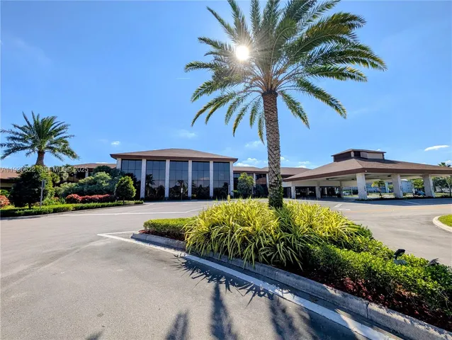 a view of room with wooden floor