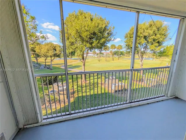 a view of a large window with an outdoor space