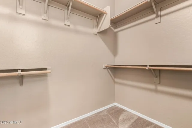 a view of a room with racks on the wall