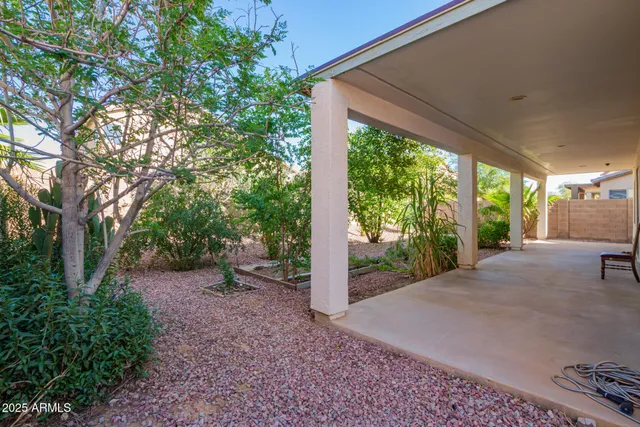 a view of a backyard with garden