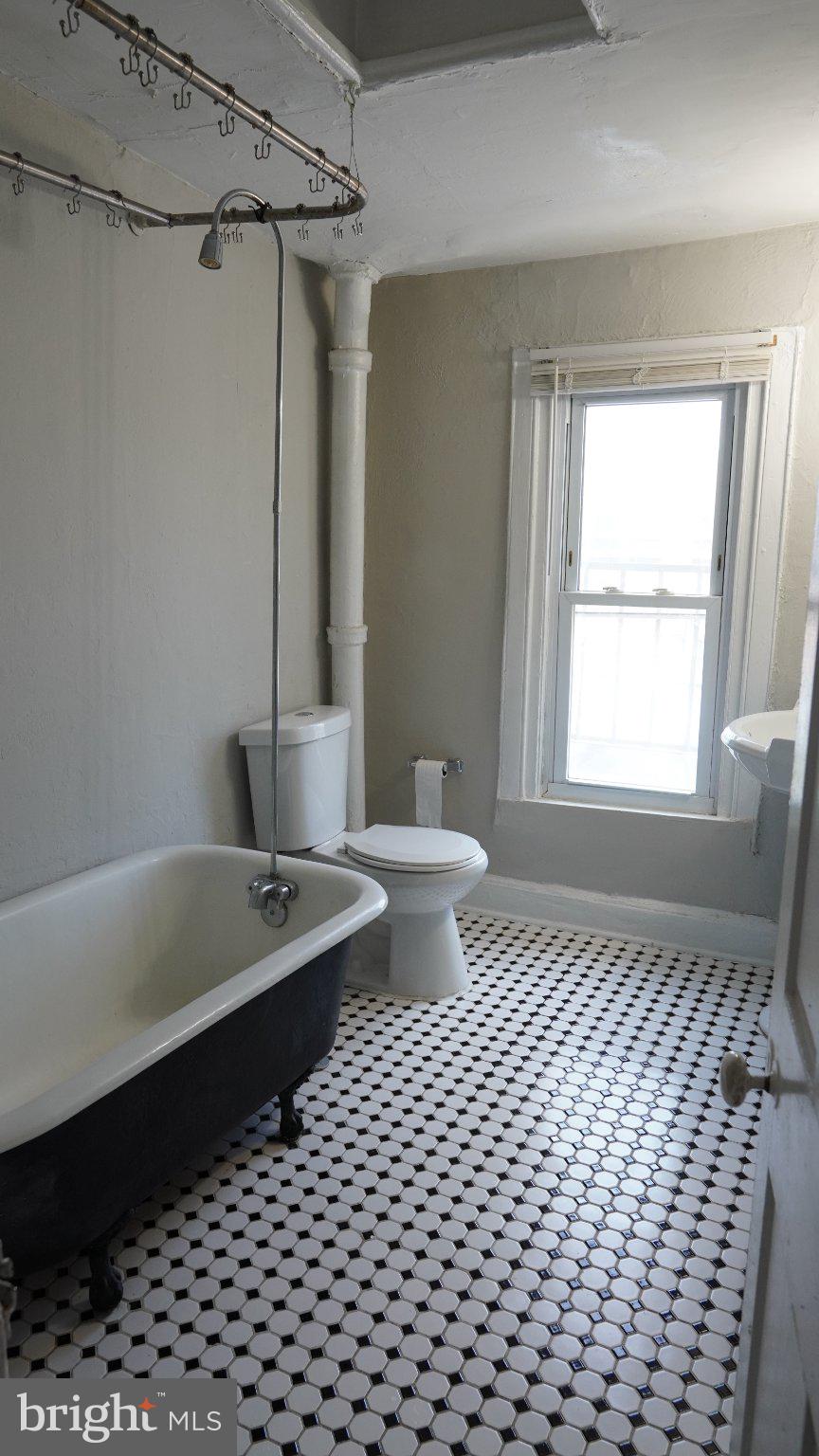917 North Calvert Street, Unit 6 Baltimore, MD 21202 - Photo 9 of 10 Charming vintage bathroom with character.