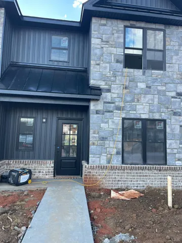 a front view of a house with entryway