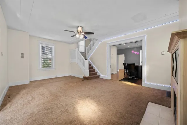 a view of empty room with windows