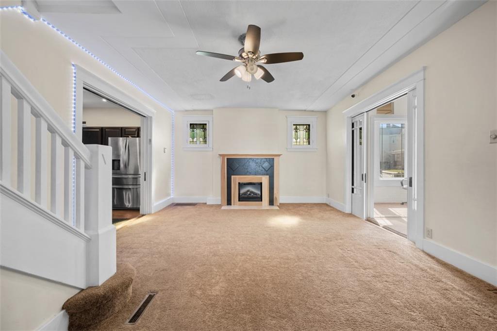 254 Ridge Avenue New Kensington, PA 15068 - Photo 10 of 50 a view of an empty room with a fireplace