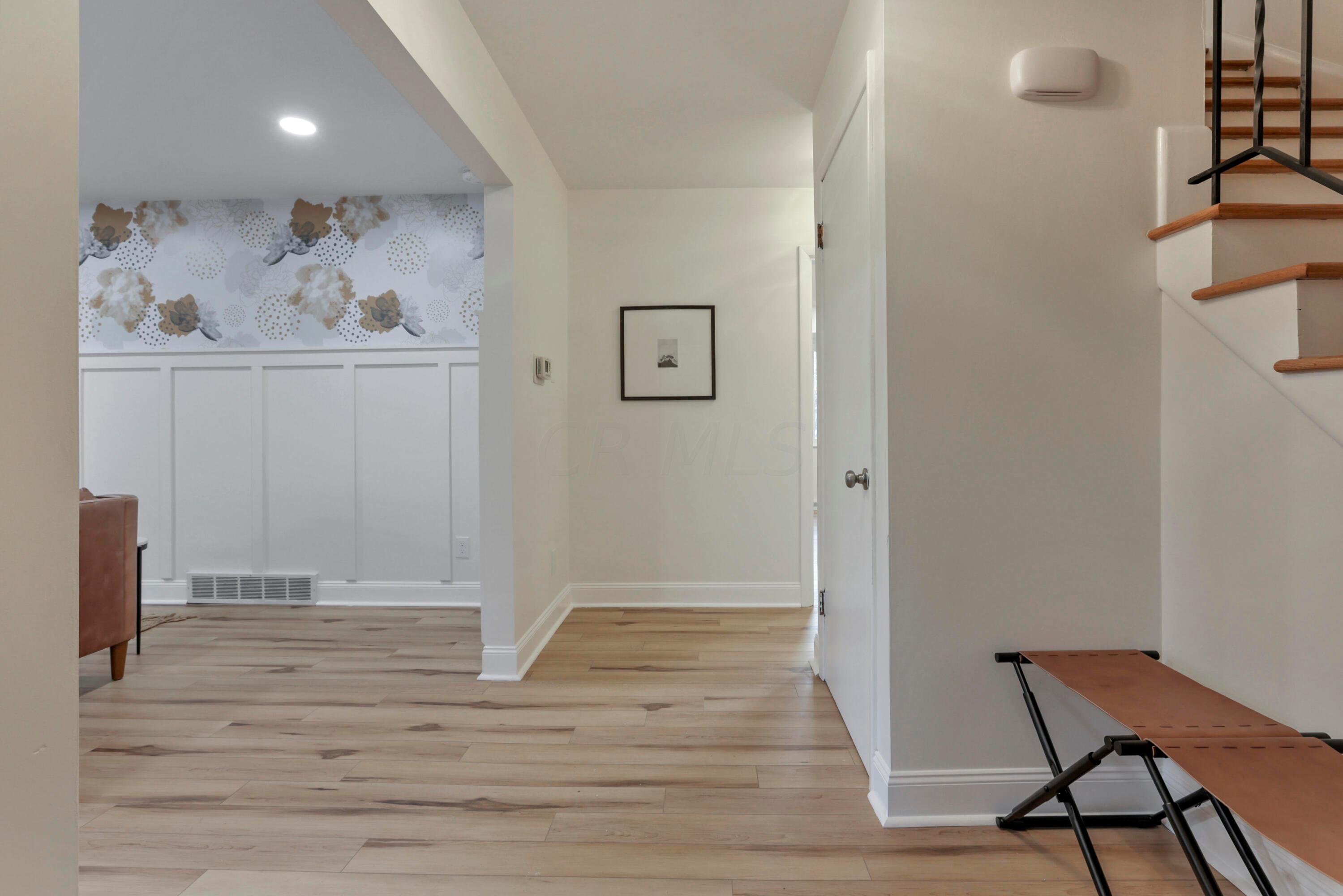 2275 Haverford Road Columbus, OH 43220 - Photo 3 of 57 Renovated first floor with new waterproof & scratch resistant LVP flooring, 5” wood trim throughout and fresh paint.