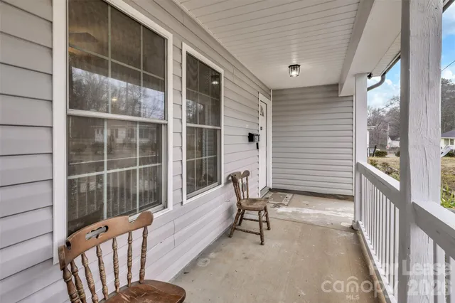 a view of a porch with a yard