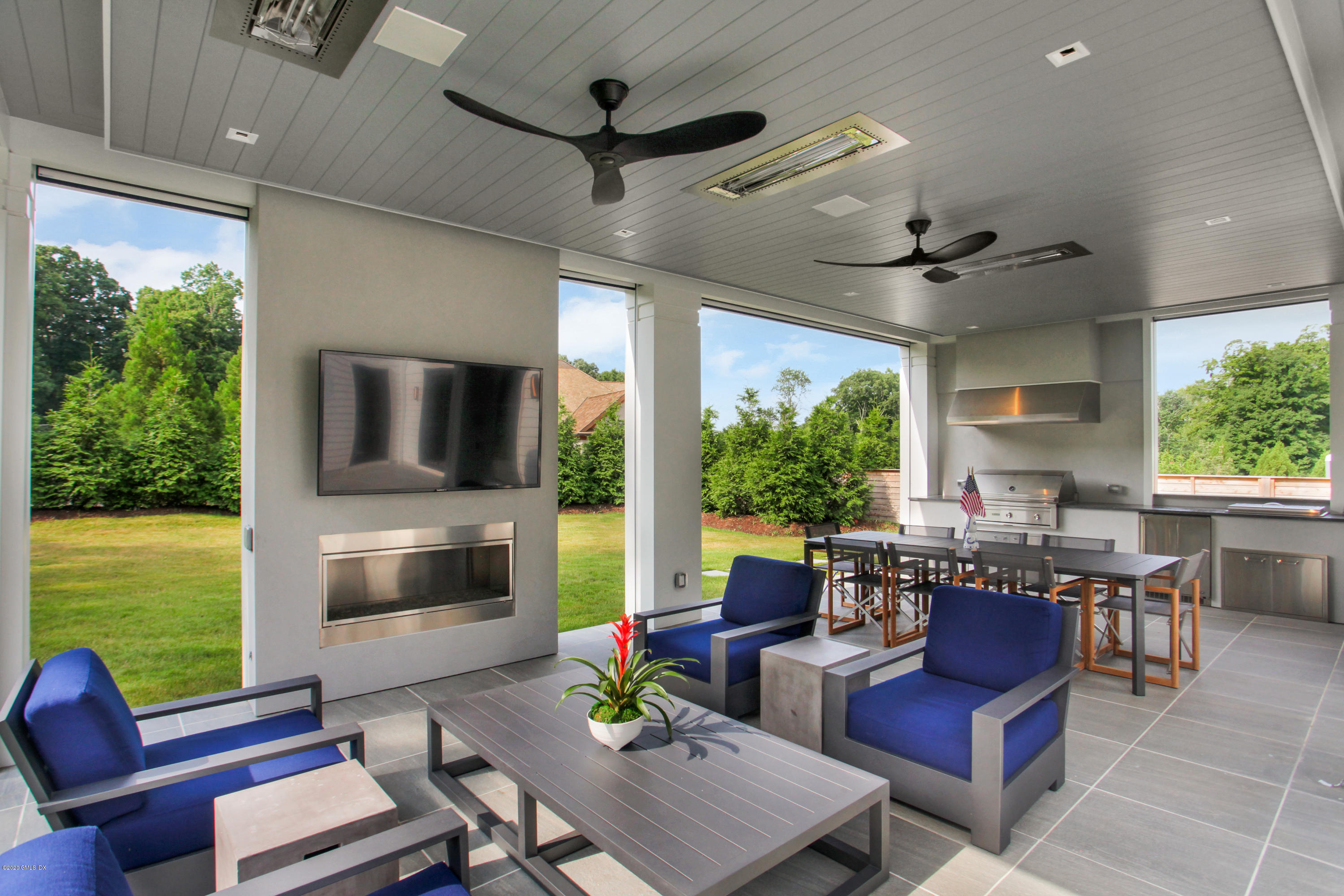 24 Thunder Mountain Road Greenwich, CT 06831 - Photo 37 of 41 Outdoor Summer Kitchen with fireplace