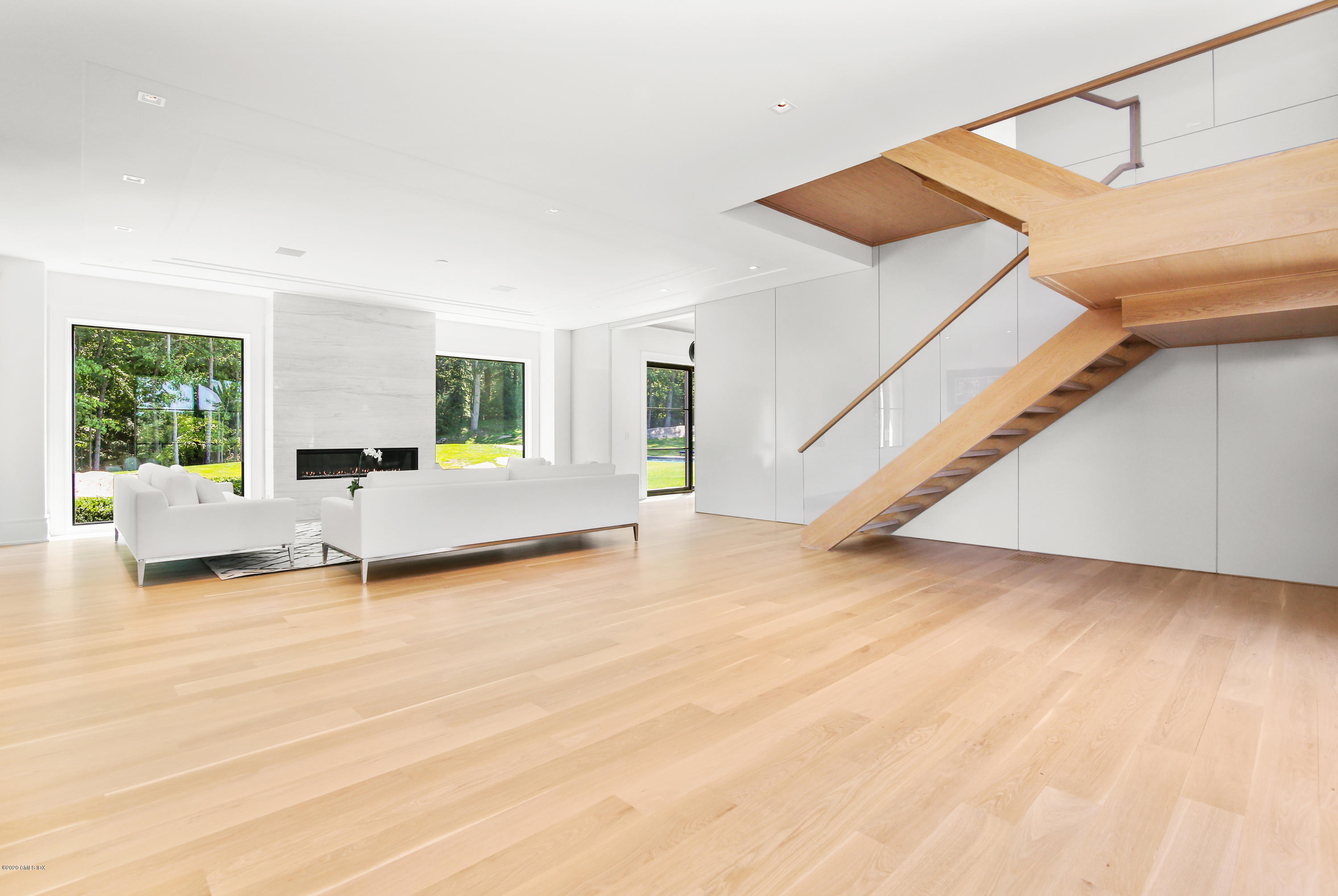 24 Thunder Mountain Road Greenwich, CT 06831 - Photo 41 of 41 Open floor plan with floating staircase