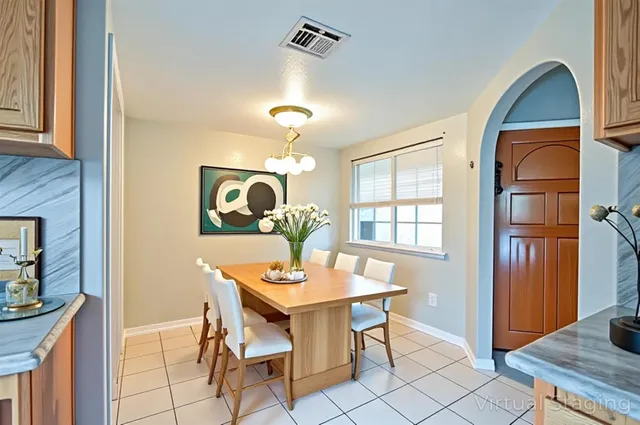 a view of a dining room with furniture