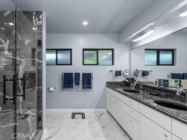 195 Howell Avenue Red Bluff, CA 96080 - Photo 16 of 67 a kitchen with stainless steel appliances a sink stove and refrigerator