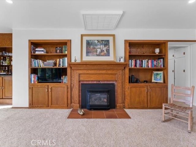 195 Howell Avenue Red Bluff, CA 96080 - Photo 19 of 67 a living room with furniture and a fireplace