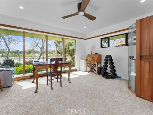 195 Howell Avenue Red Bluff, CA 96080 - Photo 25 of 67 a view of a livingroom with furniture and a floor to ceiling window