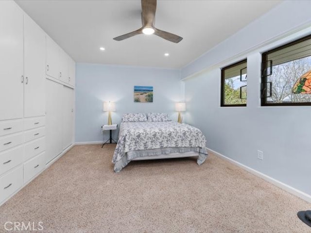 195 Howell Avenue Red Bluff, CA 96080 - Photo 27 of 67 a bedroom with a bed and a painting on the wall