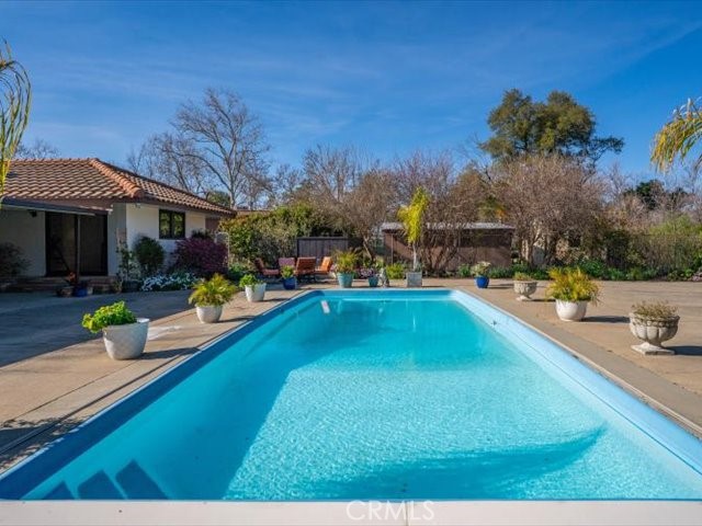 195 Howell Avenue Red Bluff, CA 96080 - Photo 57 of 67 a view of a house with swimming pool and sitting area