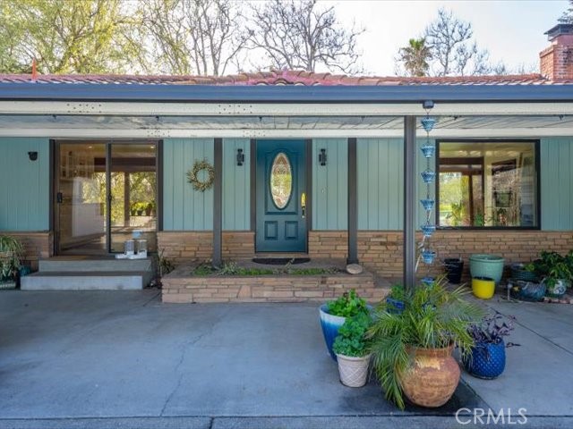 195 Howell Avenue Red Bluff, CA 96080 - Photo 66 of 67 a front view of a house with a porch