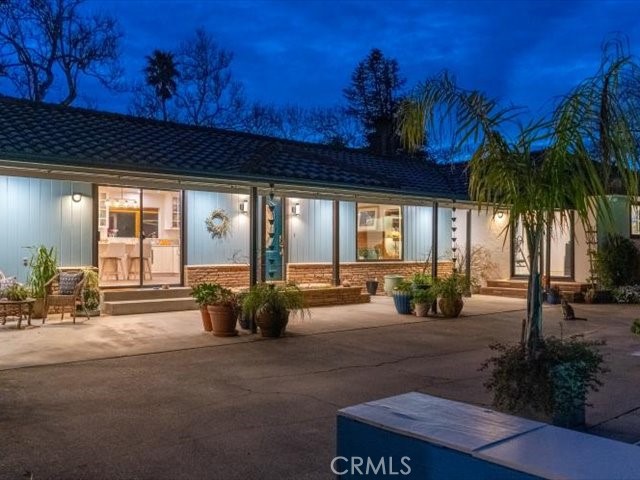 195 Howell Avenue Red Bluff, CA 96080 - Photo 10 of 67 a view of a house with backyard and sitting area